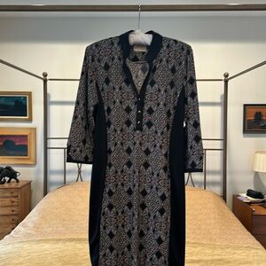 EP Pro 3/4 sleeve black golf dress.  Button down front.  Back pocket.  Size L